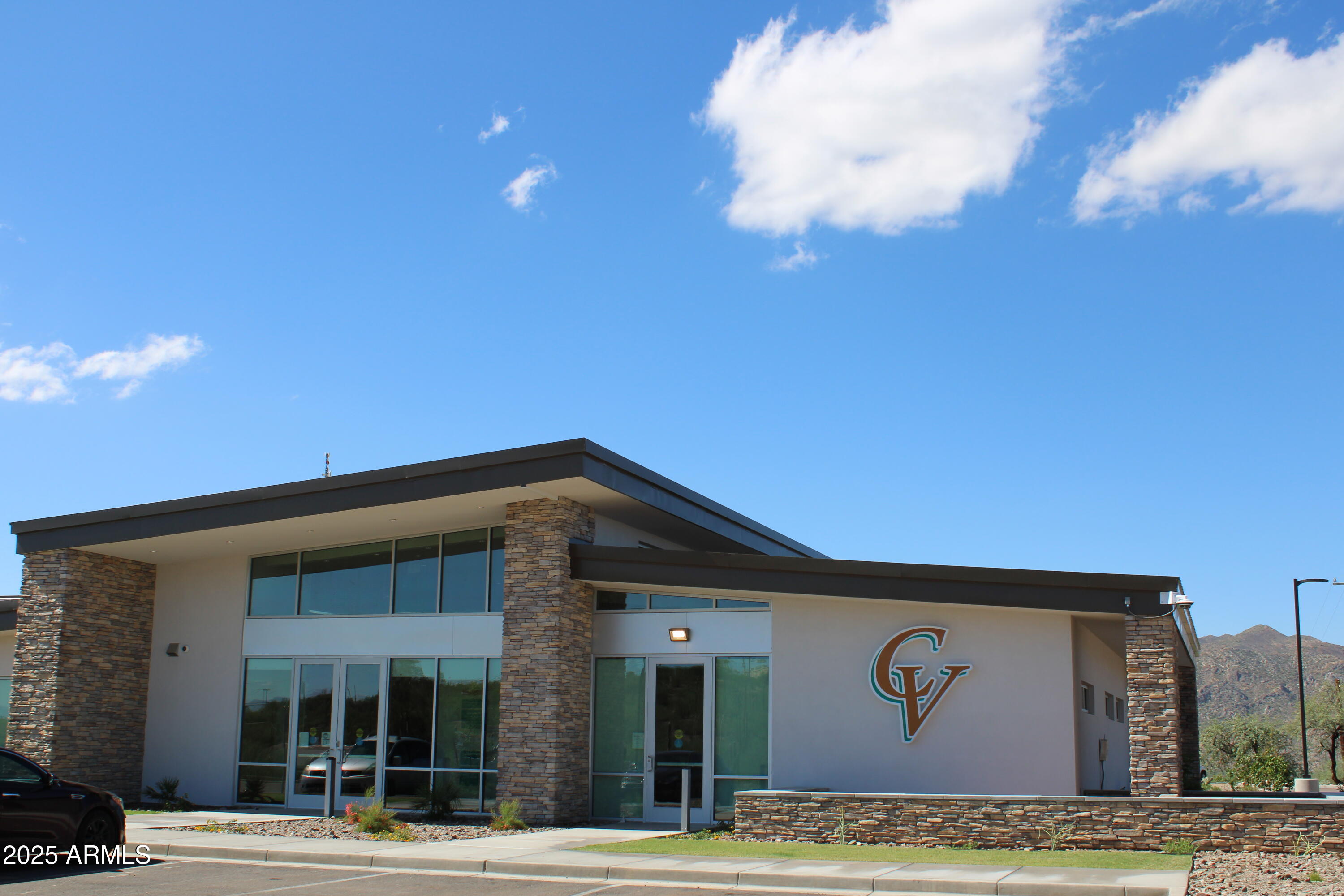 336 Greenwich Road Kearny, AZ 85137 - Photo 33 of 37 a front view of a building with grey walls