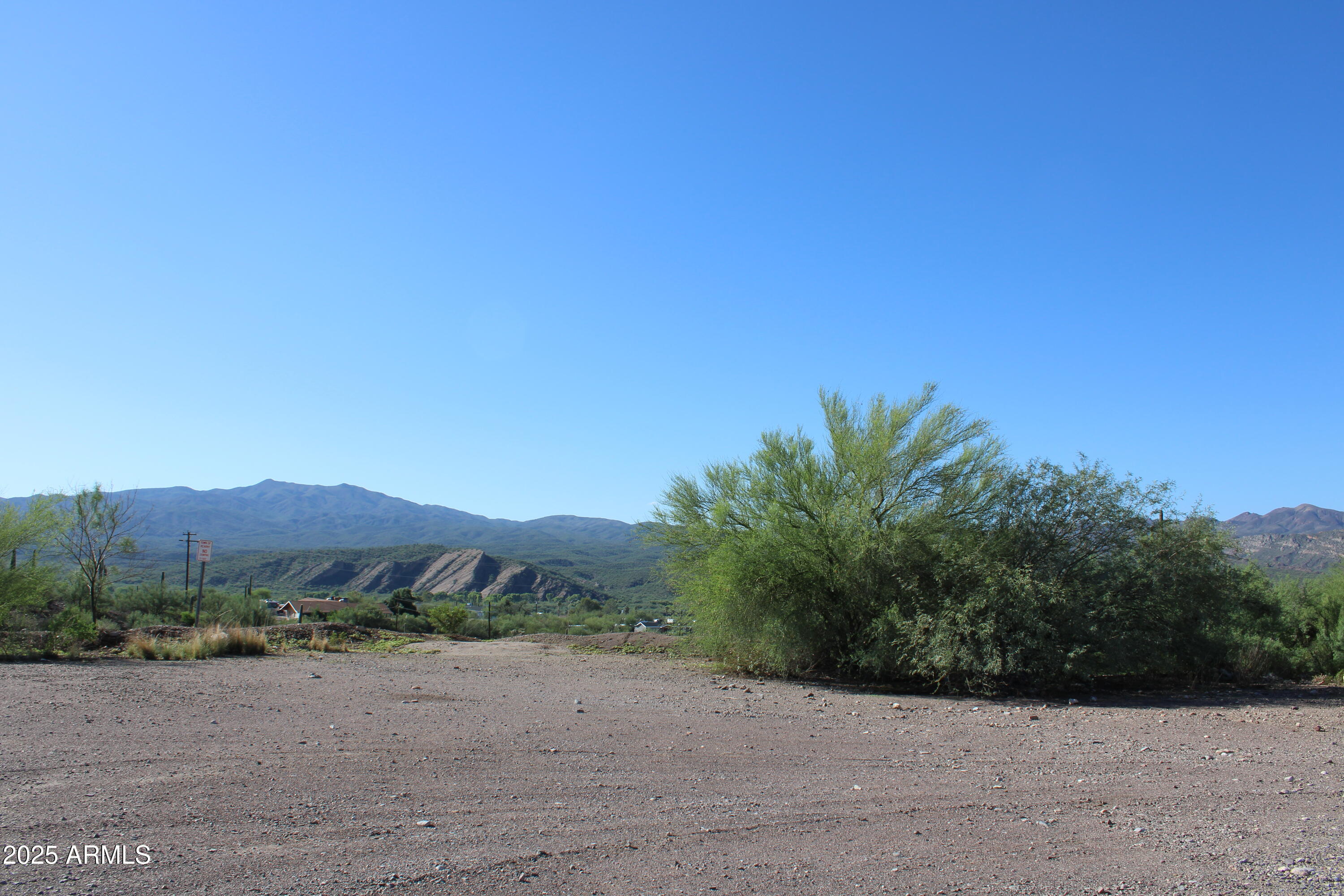 336 Greenwich Road Kearny, AZ 85137 - Photo 37 of 37 a view of a dry field with trees in the background