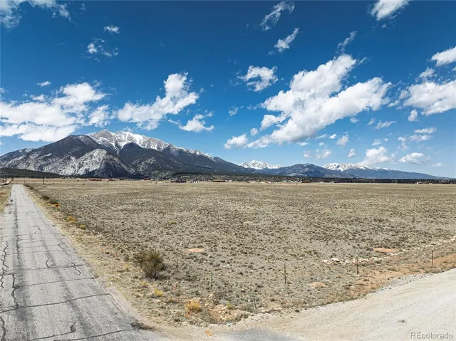 a view of a room with a fireplace