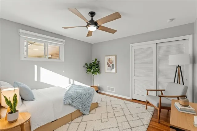 a living room with furniture and white walls