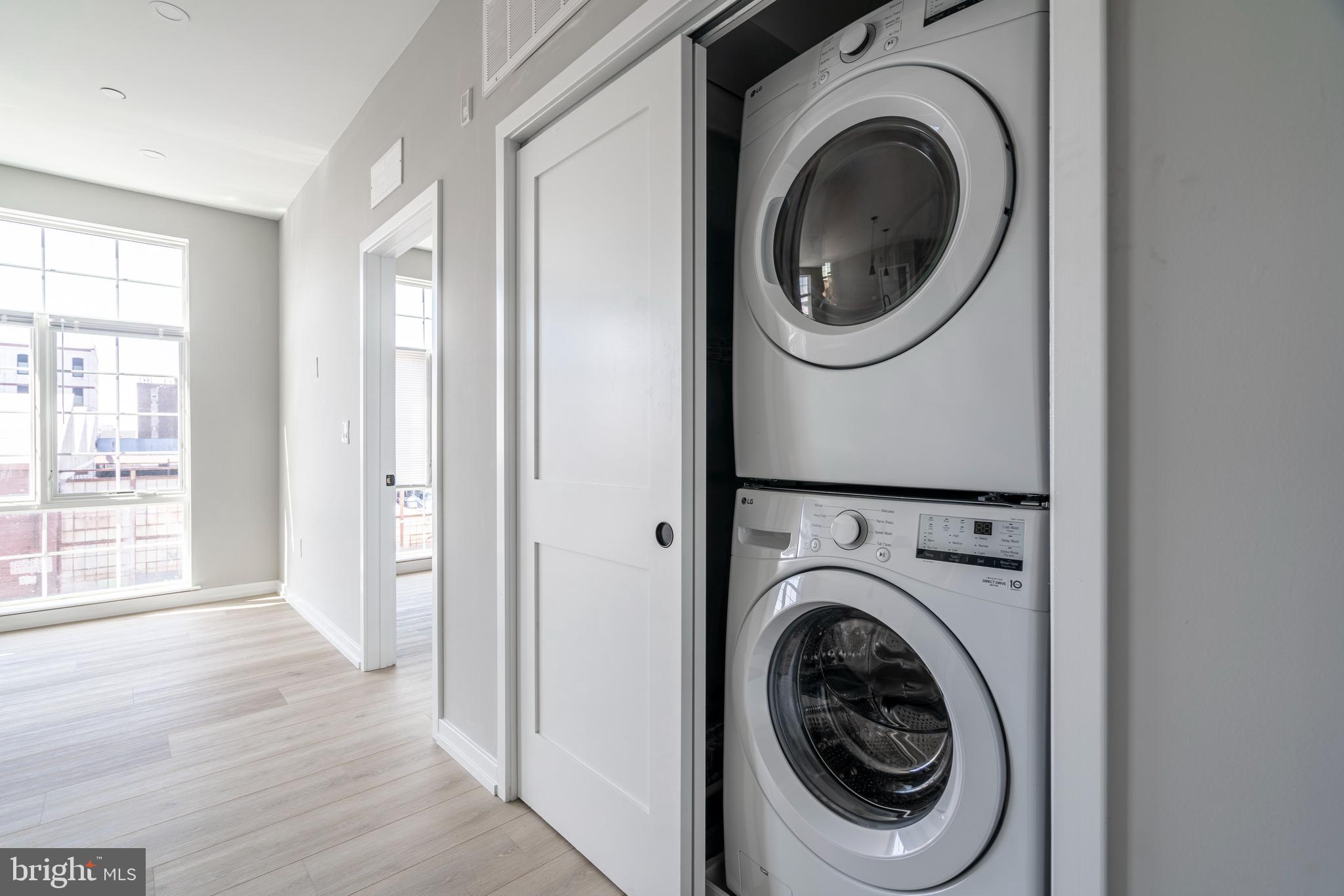2401 Washington Avenue, Unit 3D Philadelphia, PA 19146 - Photo 14 of 18 a utility room with dryer and washer