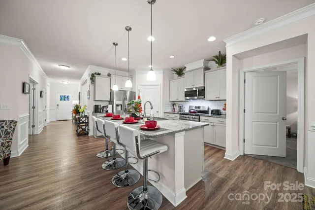 a kitchen and a refrigerator in a kitchen