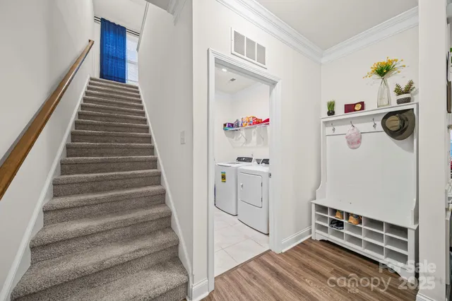 a utility room with dryer and washer