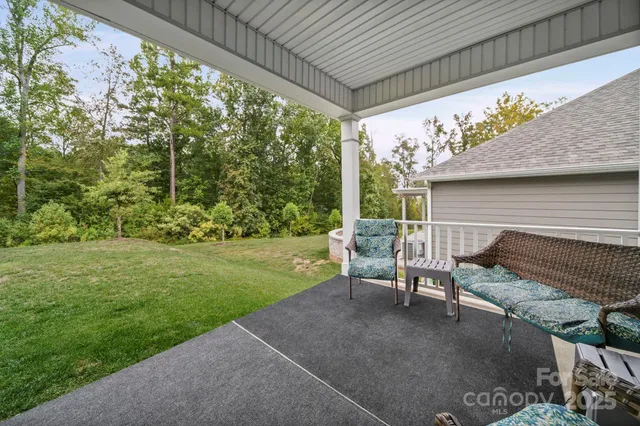 a picture of a room with a white house and sink
