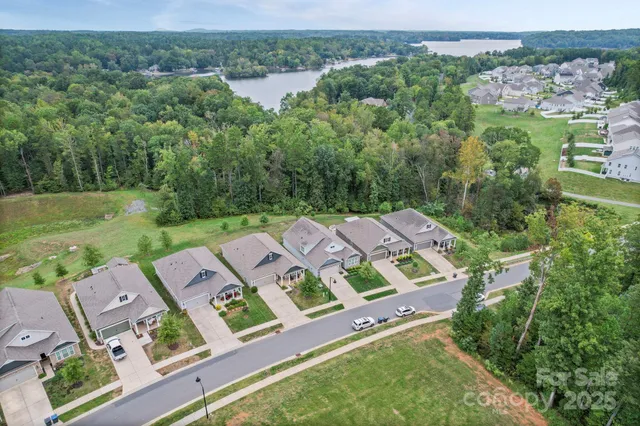 an aerial view of a house with a garden