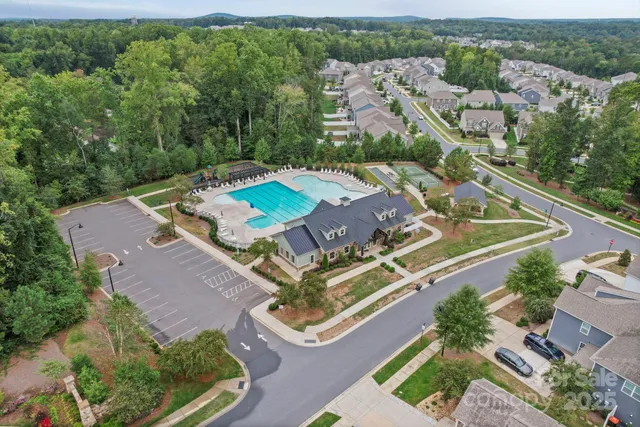 an aerial view of a house with a garden