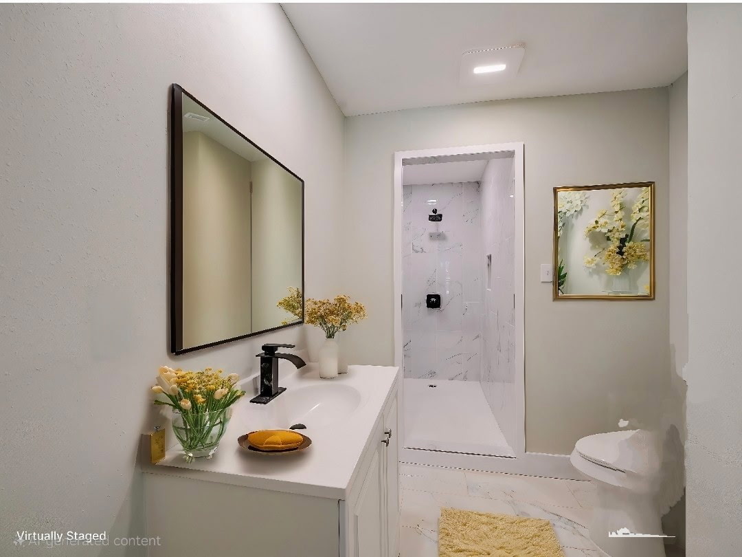 7004 Craybrough Circle Austin, TX 78724 - Photo 1 of 19 A well-appointed bathroom features a sleek vanity, contemporary fixtures, and a spacious walk-in shower.