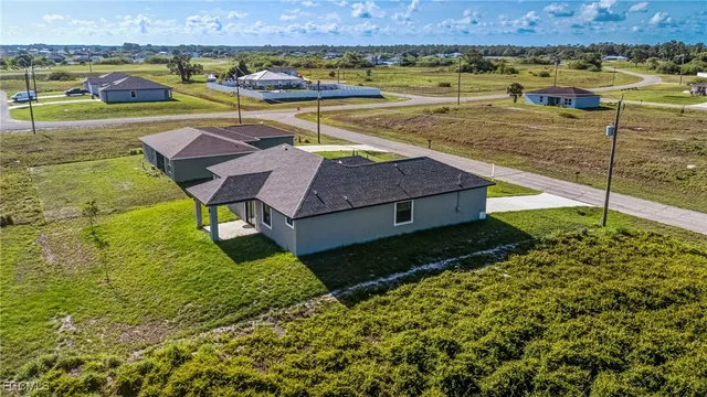 swimming pool view with a outdoor seating space