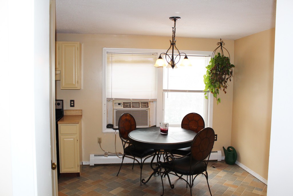 39 Winchendon Road Ashburnham, MA 01430 - Photo 8 of 14 a dining room with furniture and chandelier kitchen view