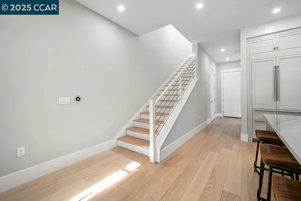 a view of entryway with wooden floor