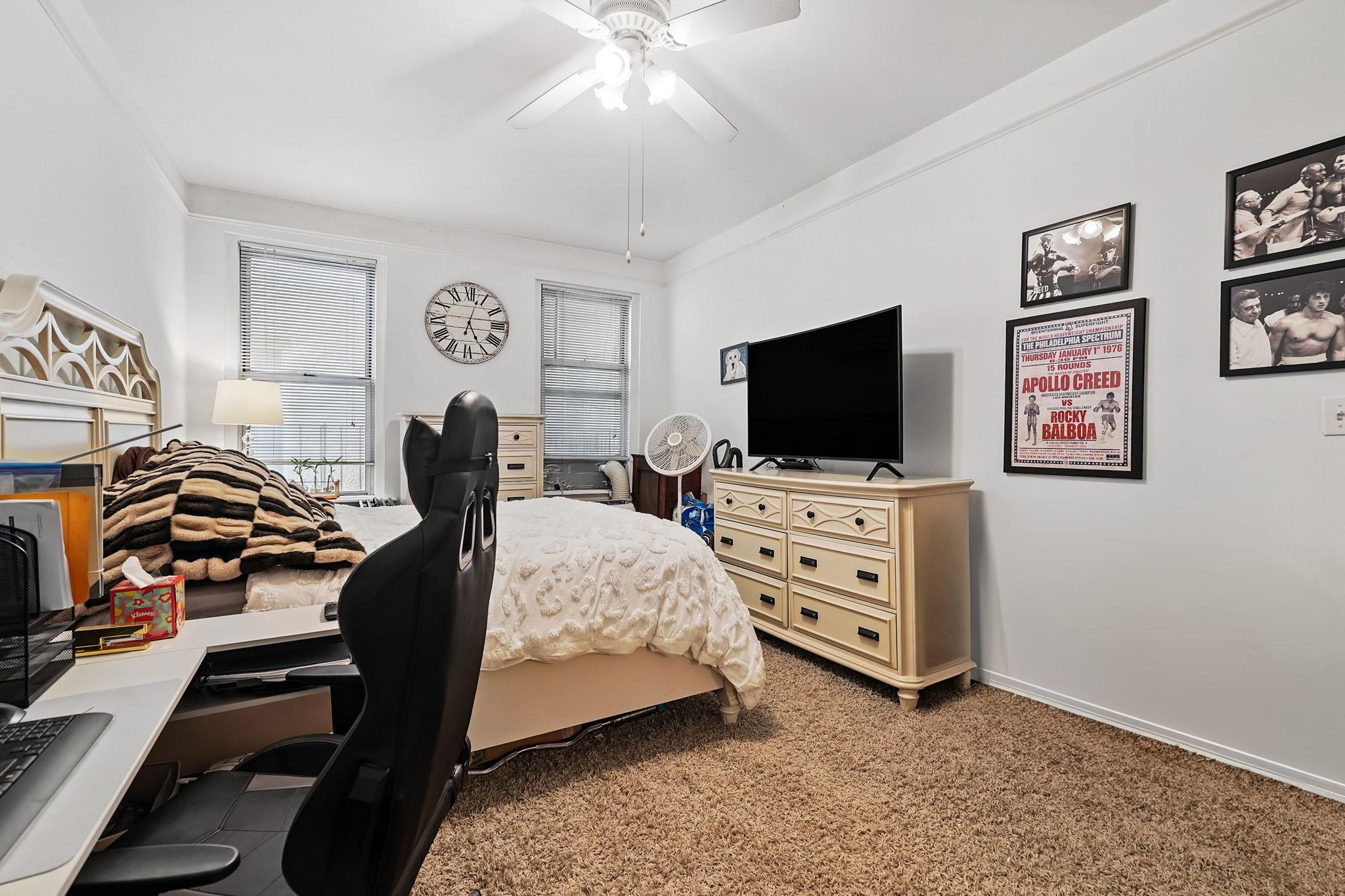 472 Gramatan Avenue, Unit CC3 Mount Vernon, NY 10552 - Photo 14 of 25 a view of a livingroom with furniture and a flat screen tv