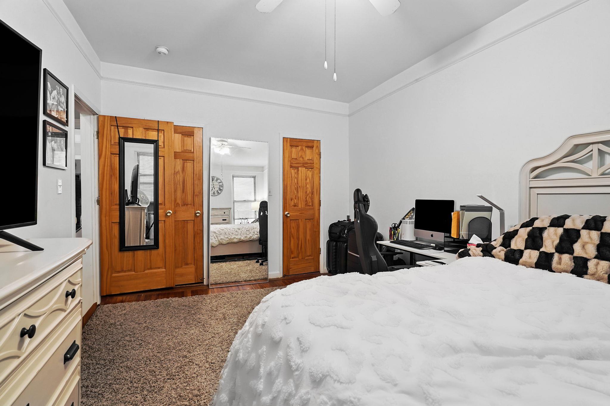 472 Gramatan Avenue, Unit CC3 Mount Vernon, NY 10552 - Photo 15 of 25 a bedroom with bed and large windows