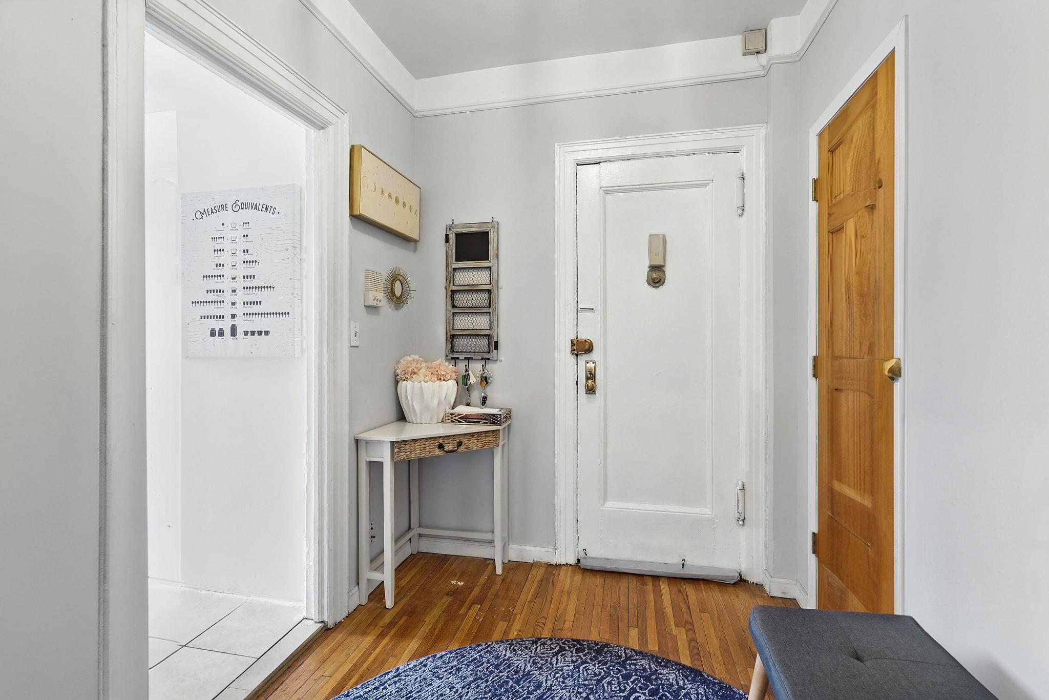 472 Gramatan Avenue, Unit CC3 Mount Vernon, NY 10552 - Photo 5 of 25 a bedroom with a bed and a table in it