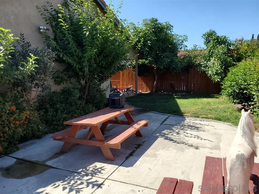 4876 Sumac Place Oceanside, CA 92057 - Photo 13 of 14 an outdoor sitting area with furniture and garden
