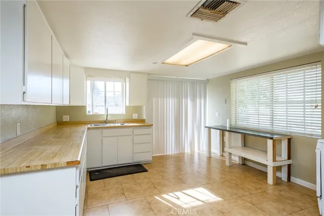 a view of a house with swimming pool