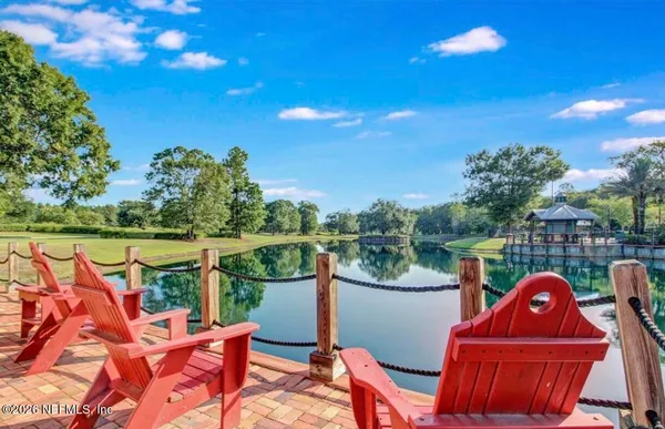 a front view of a building with garden