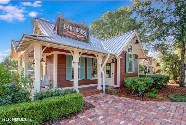 a view of a lake with a building in the background