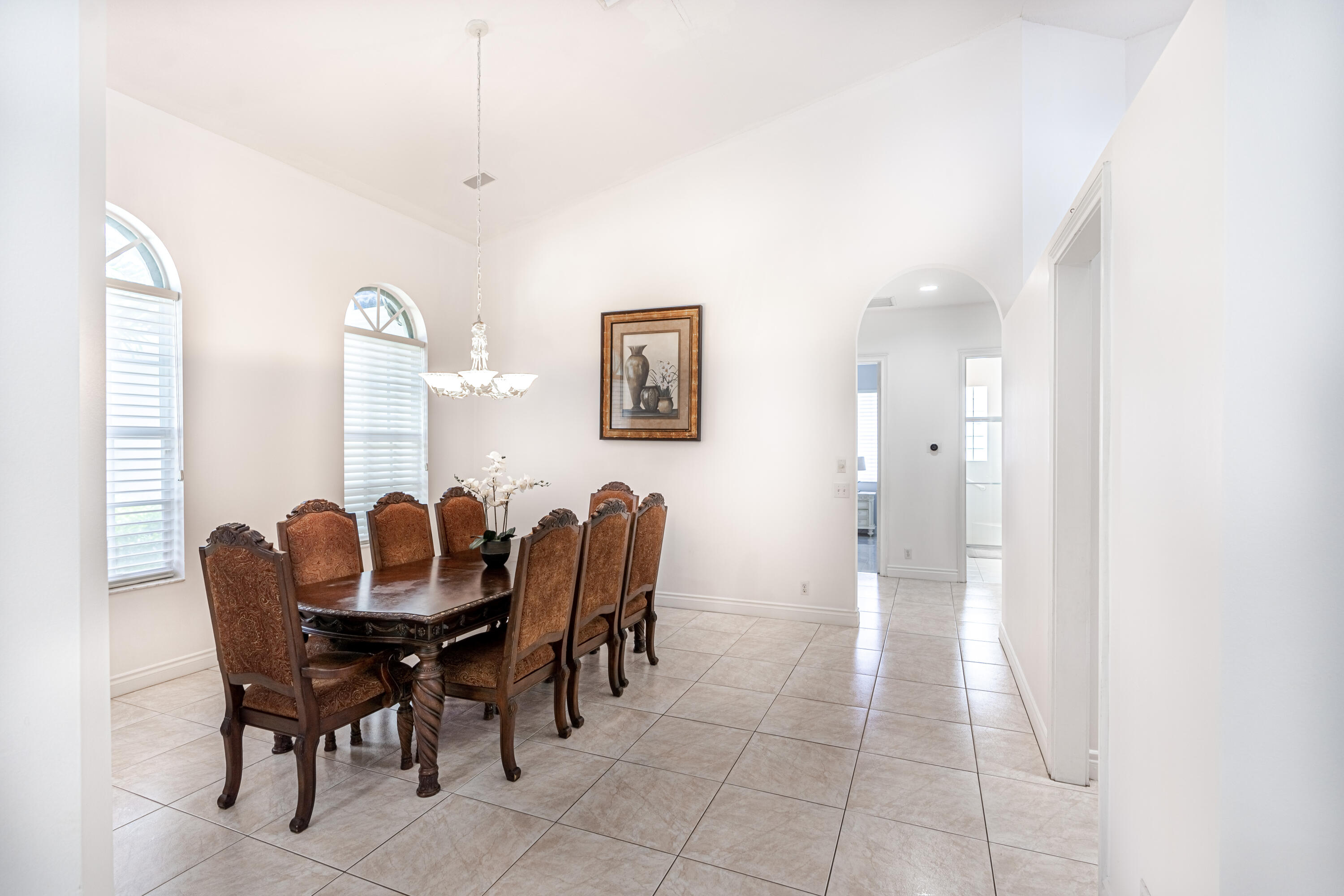 15350 Take Off Place Wellington, FL 33414 - Photo 15 of 44 a view of a dining room with furniture