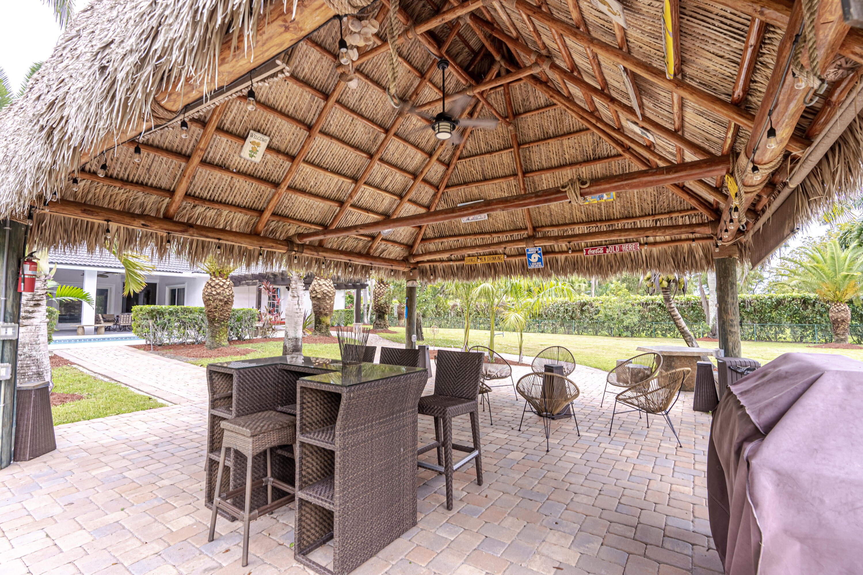 15350 Take Off Place Wellington, FL 33414 - Photo 43 of 44 a view of a patio with chairs and tables