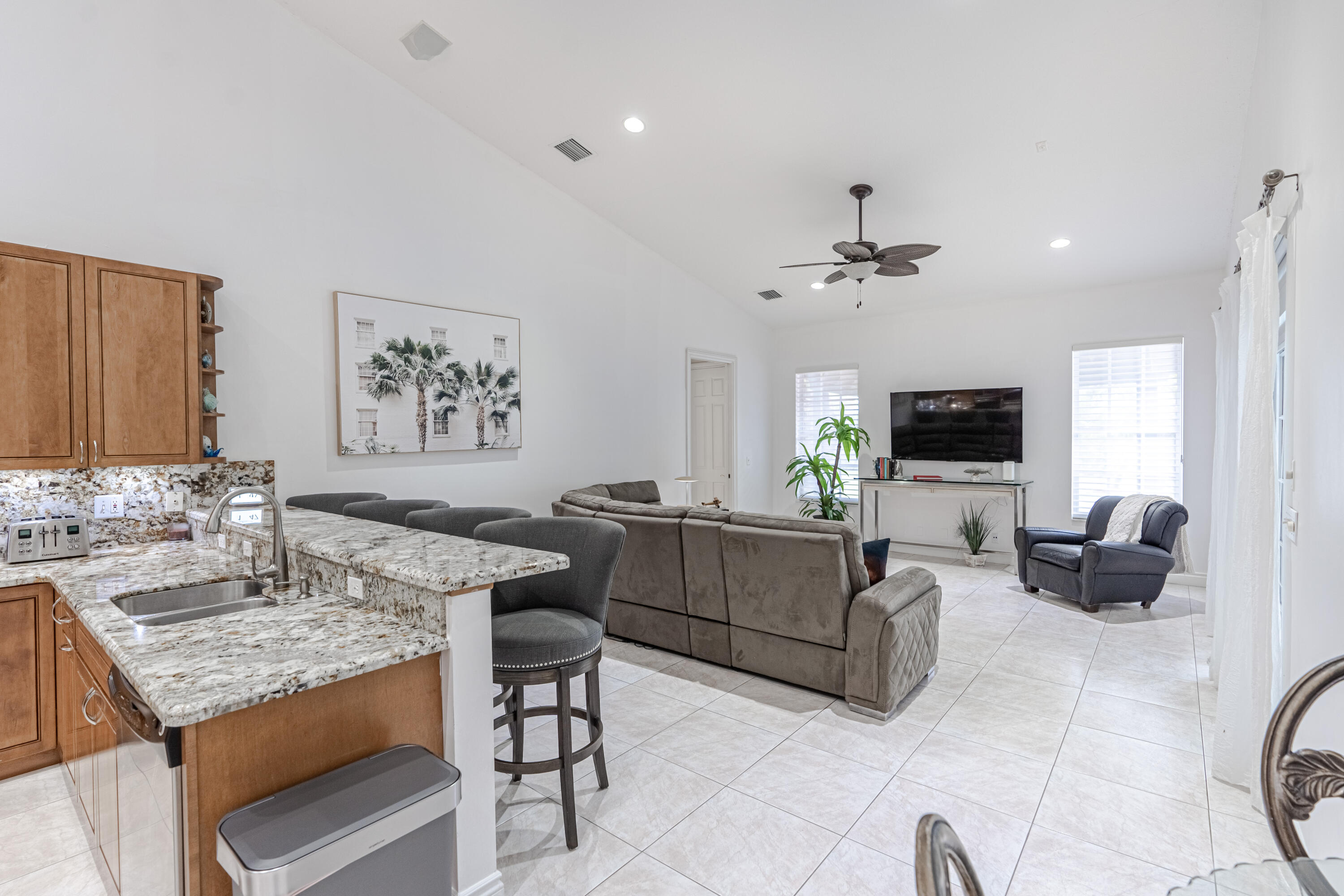 15350 Take Off Place Wellington, FL 33414 - Photo 7 of 44 a living room with furniture and a wooden floor