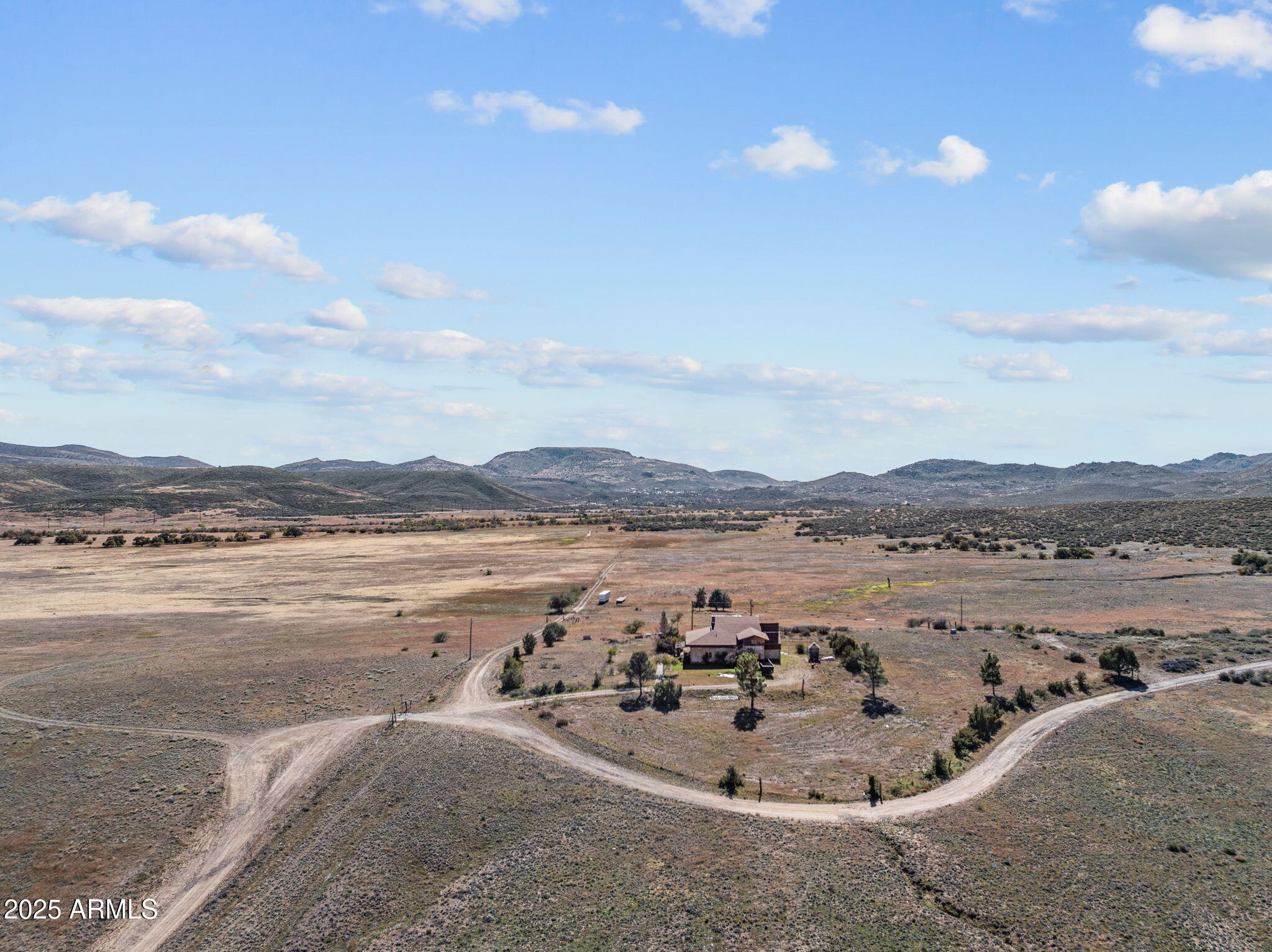 16057 Sickles Ranch Road Peeples Valley, AZ 86332 - Photo 29 of 40 a view of a lake with a mountain