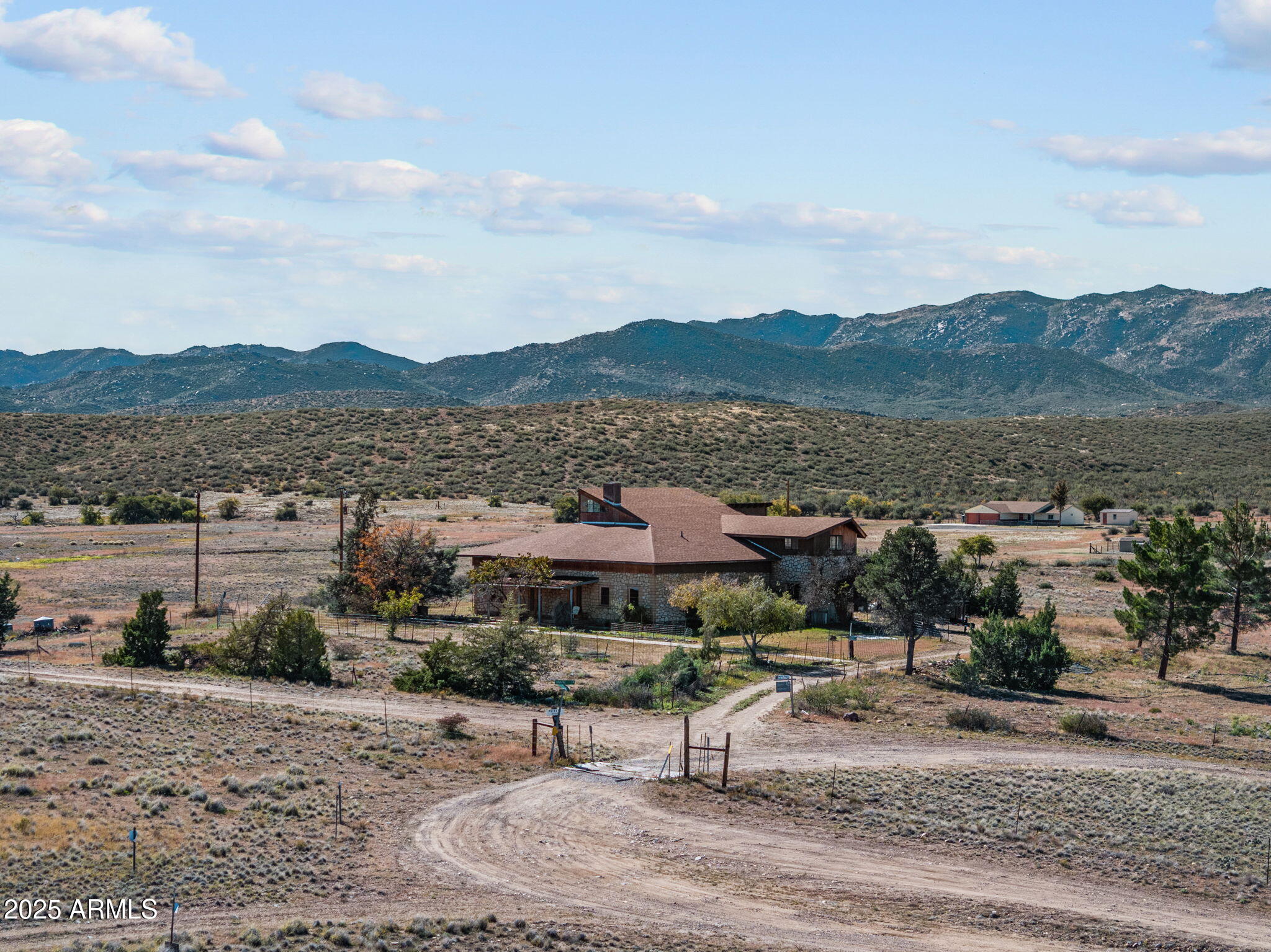 16057 Sickles Ranch Road Peeples Valley, AZ 86332 - Photo 5 of 40 a view of a lake with a mountain