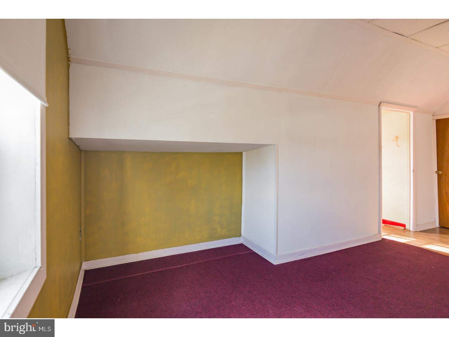 116 Warwick Road Magnolia, NJ 08049 - Photo 19 of 24 a view of an empty room and wooden floor