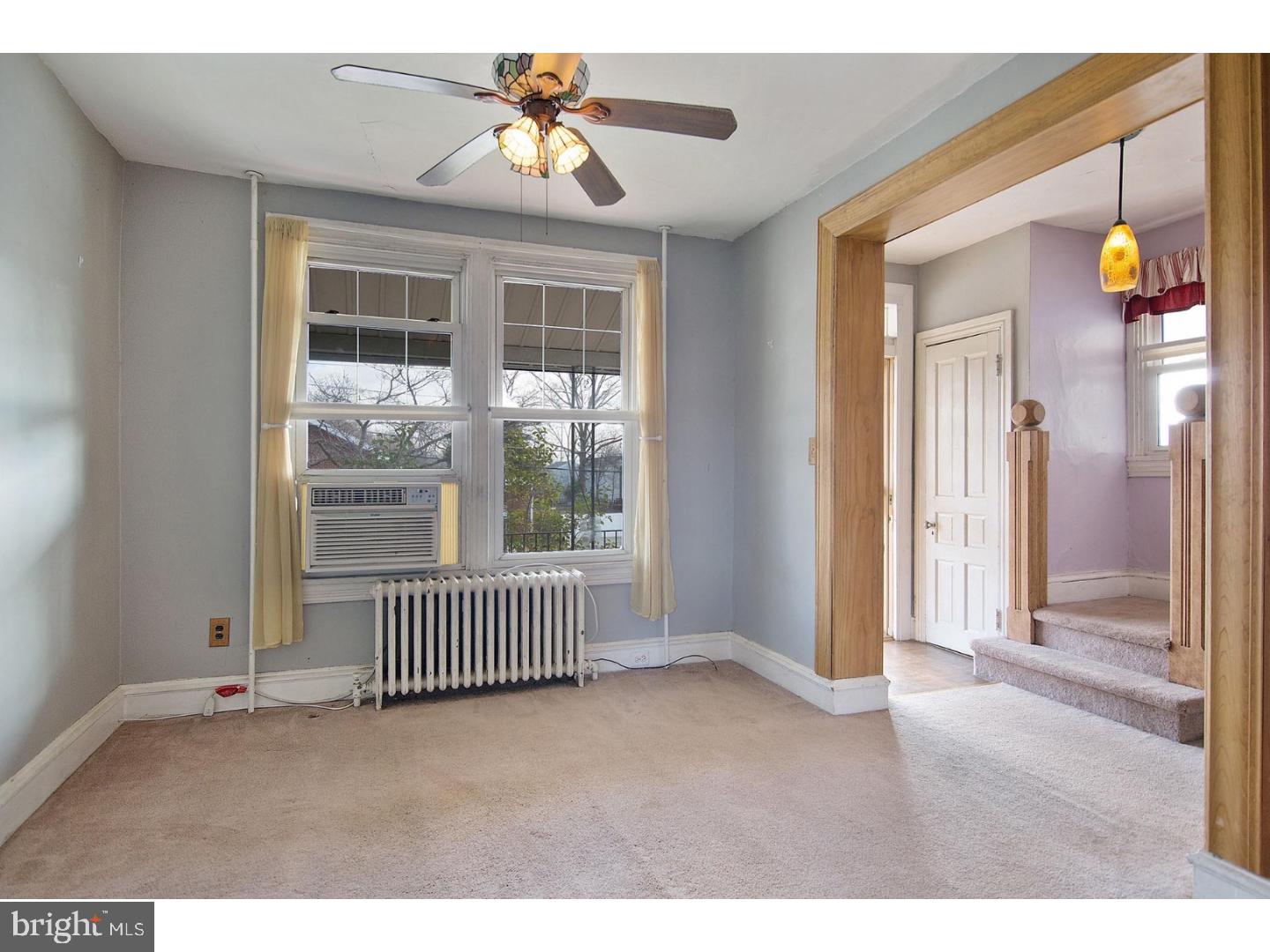 116 Warwick Road Magnolia, NJ 08049 - Photo 3 of 24 a view of an empty room and window