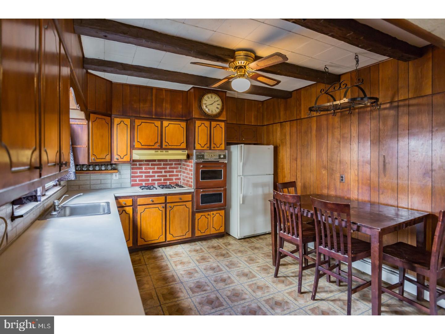 116 Warwick Road Magnolia, NJ 08049 - Photo 7 of 24 a view of a dining room with furniture and chandelier