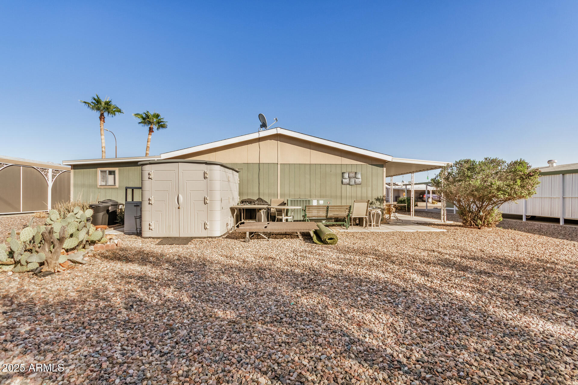 2208 West Baseline Avenue, Unit 114 Apache Junction, AZ 85120 - Photo 28 of 28 a view of a house with a outdoor space