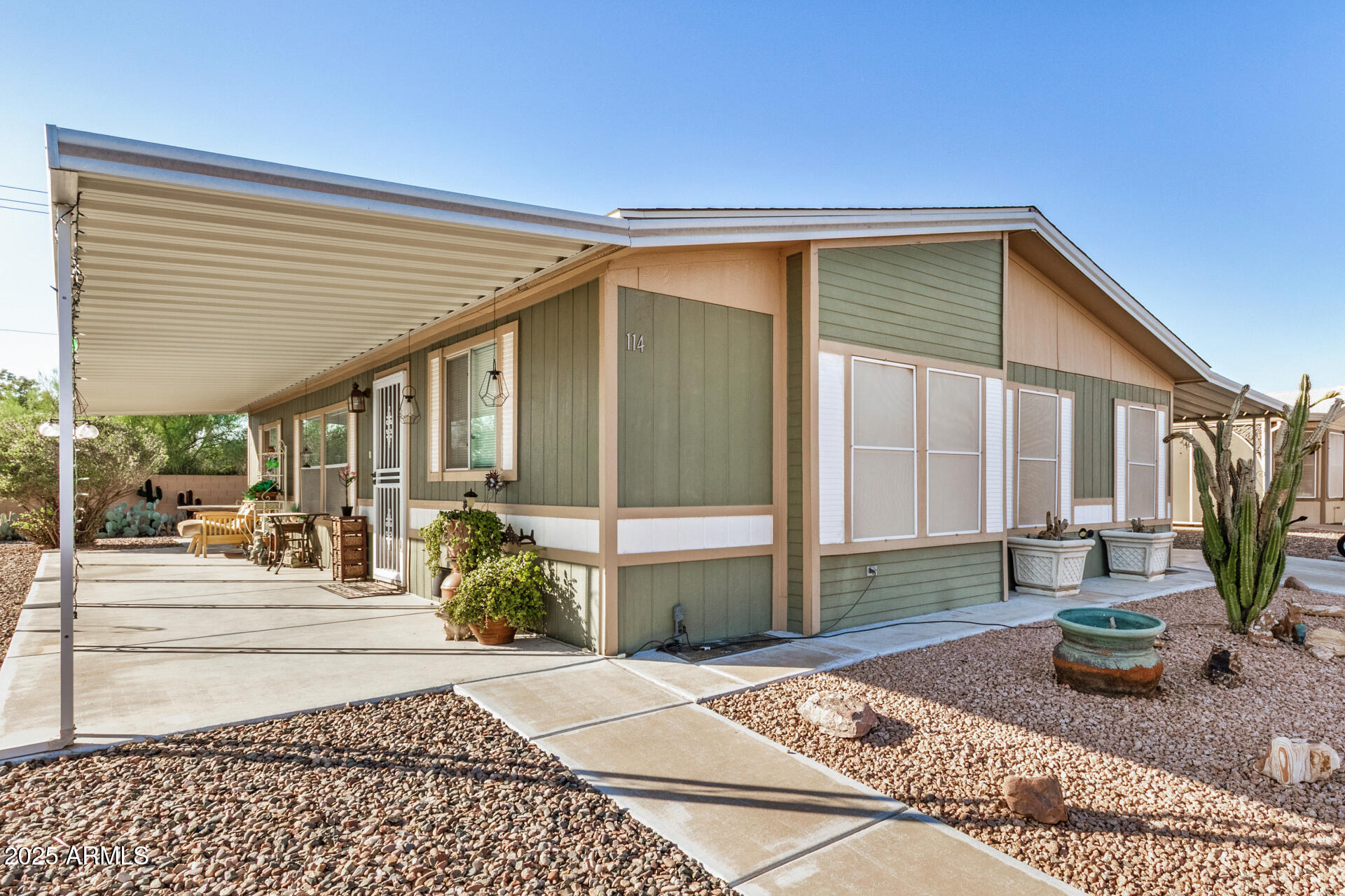 2208 West Baseline Avenue, Unit 114 Apache Junction, AZ 85120 - Photo 4 of 28 a front view of a house