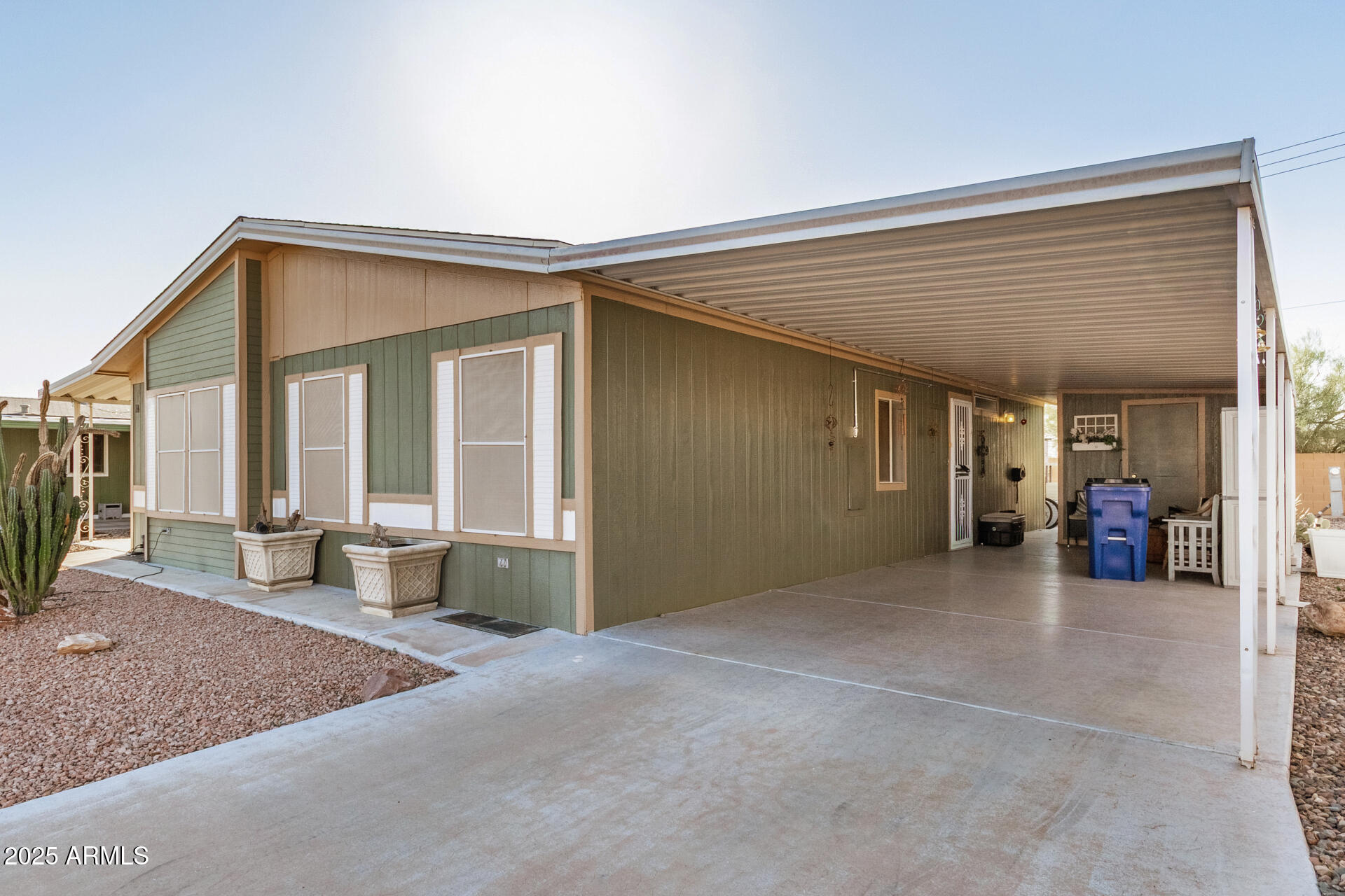 2208 West Baseline Avenue, Unit 114 Apache Junction, AZ 85120 - Photo 6 of 28 a view of a house with a porch