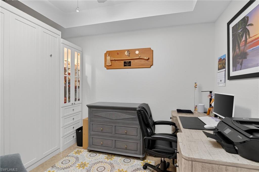 9513 Avellino Way, Unit 2014 Naples, FL 34113 - Photo 20 of 41 a view of a workspace with furniture