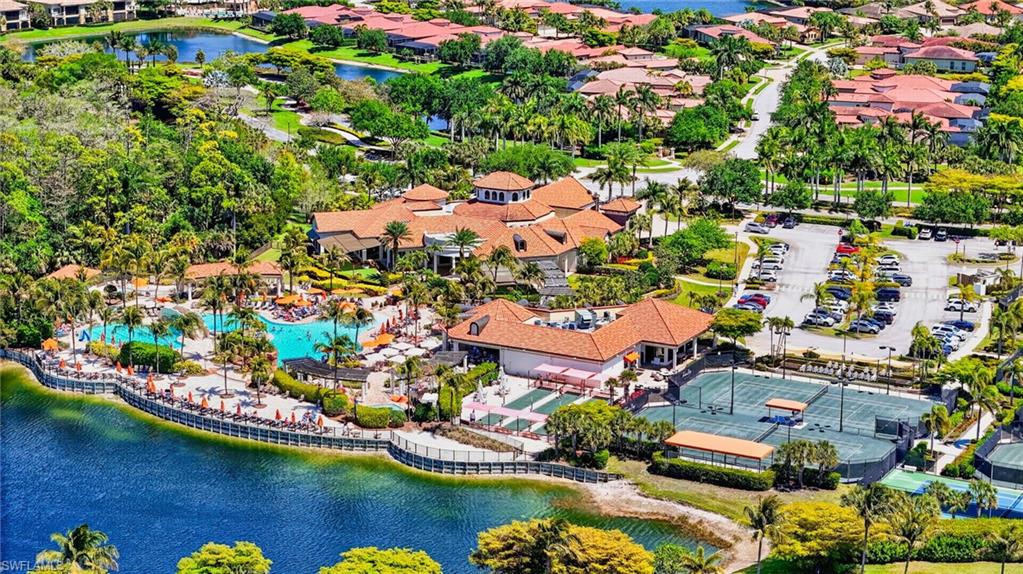 9513 Avellino Way, Unit 2014 Naples, FL 34113 - Photo 36 of 41 an aerial view of house with yard swimming pool and outdoor seating