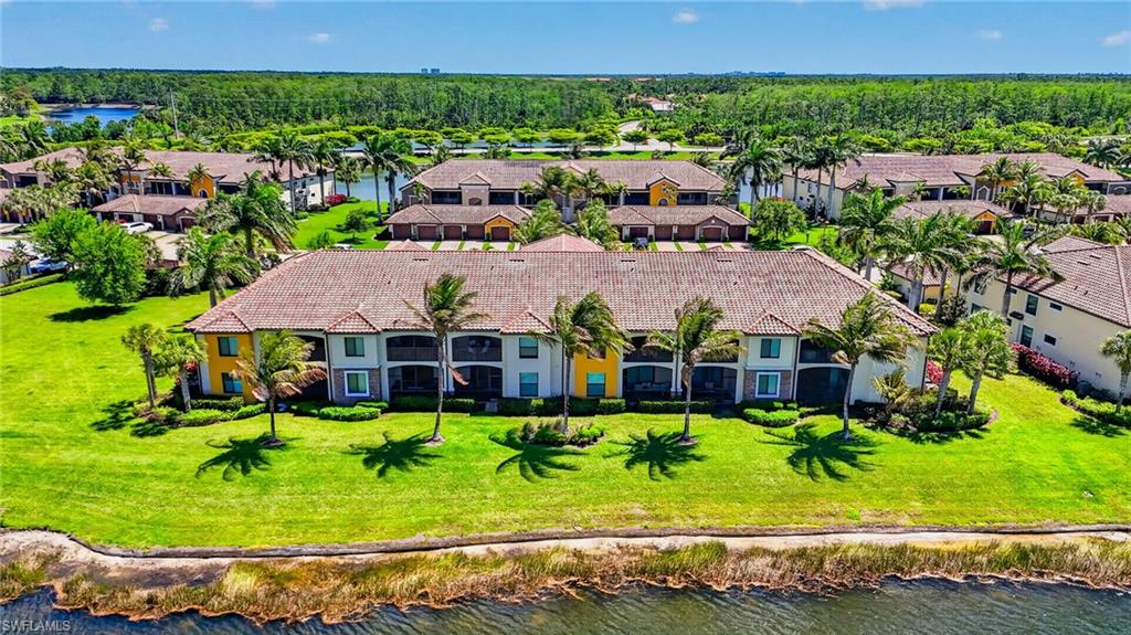 9513 Avellino Way, Unit 2014 Naples, FL 34113 - Photo 39 of 41 an aerial view of multiple house