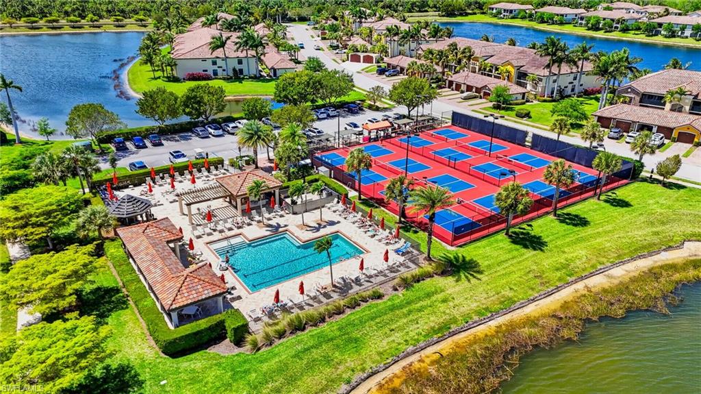 9513 Avellino Way, Unit 2014 Naples, FL 34113 - Photo 9 of 41 an aerial view of a residential houses with outdoor space and street view