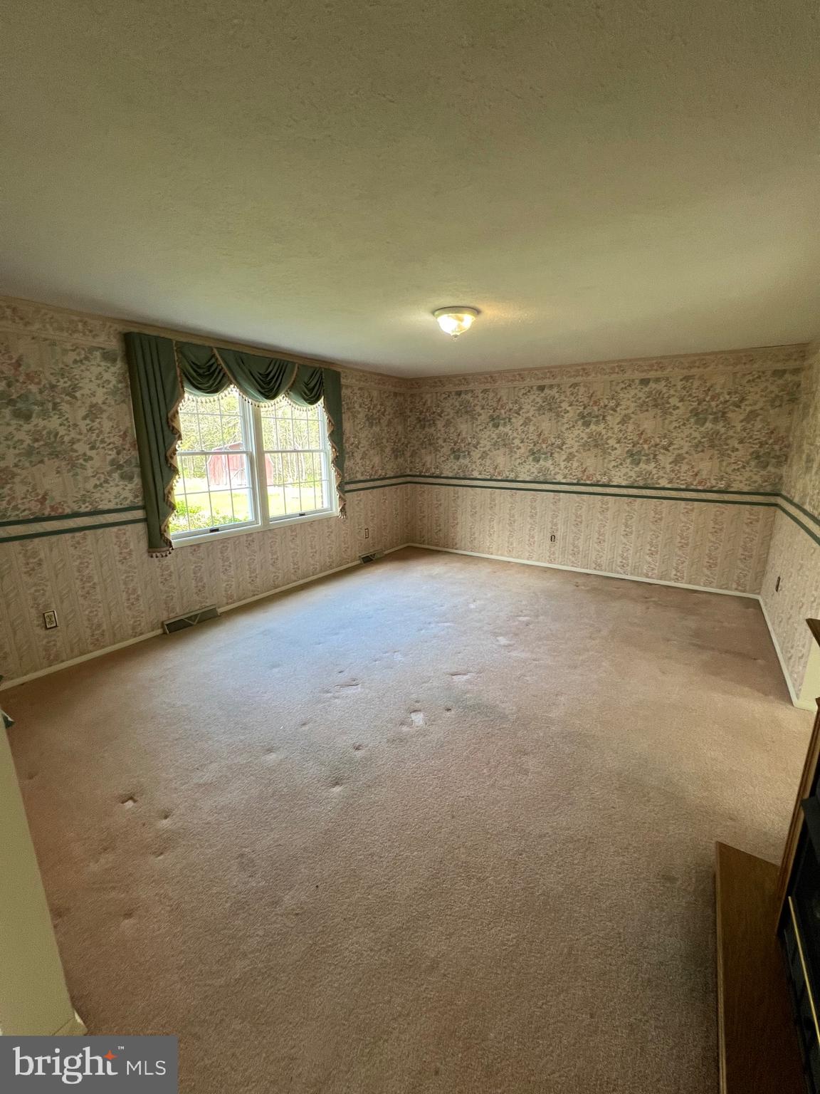 17702 Maniford Road Southeast Oldtown, MD 21555 - Photo 14 of 46 an empty room with windows