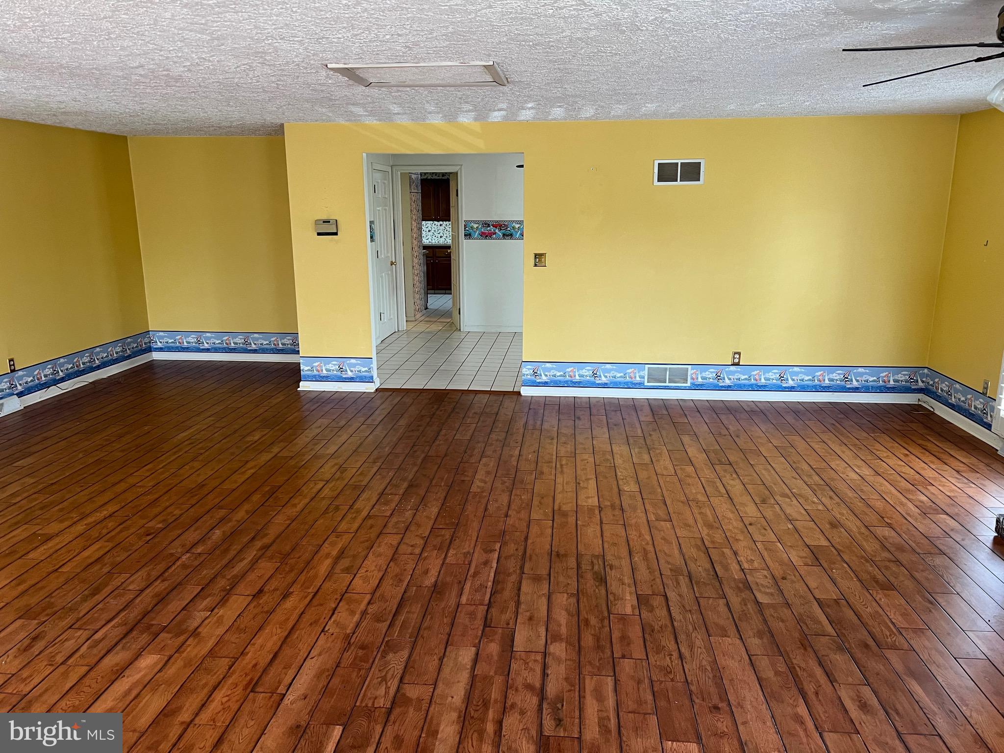 17702 Maniford Road Southeast Oldtown, MD 21555 - Photo 21 of 46 a view of empty room with wooden floor