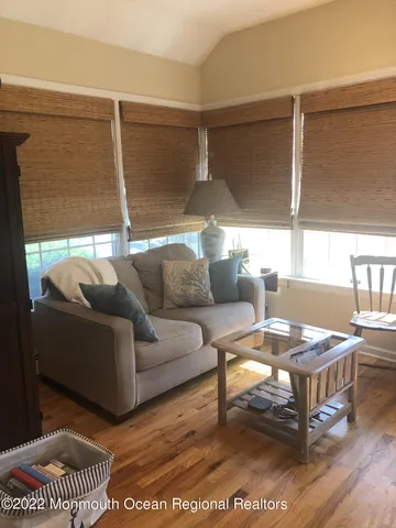 a living room with a couch and a table