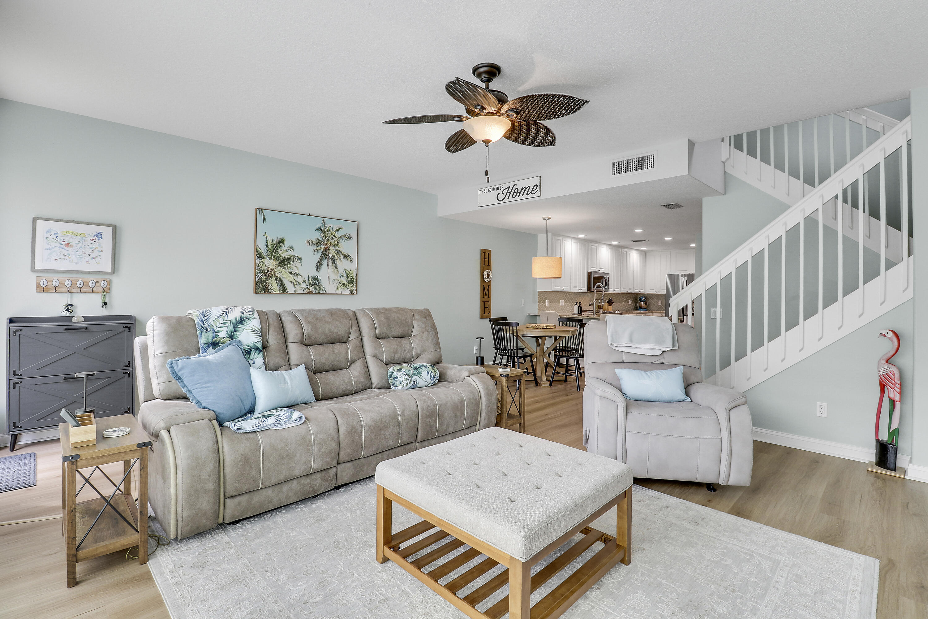 151 Rivinia Drive Jupiter, FL 33458 - Photo 11 of 40 a living room with furniture and wooden floor