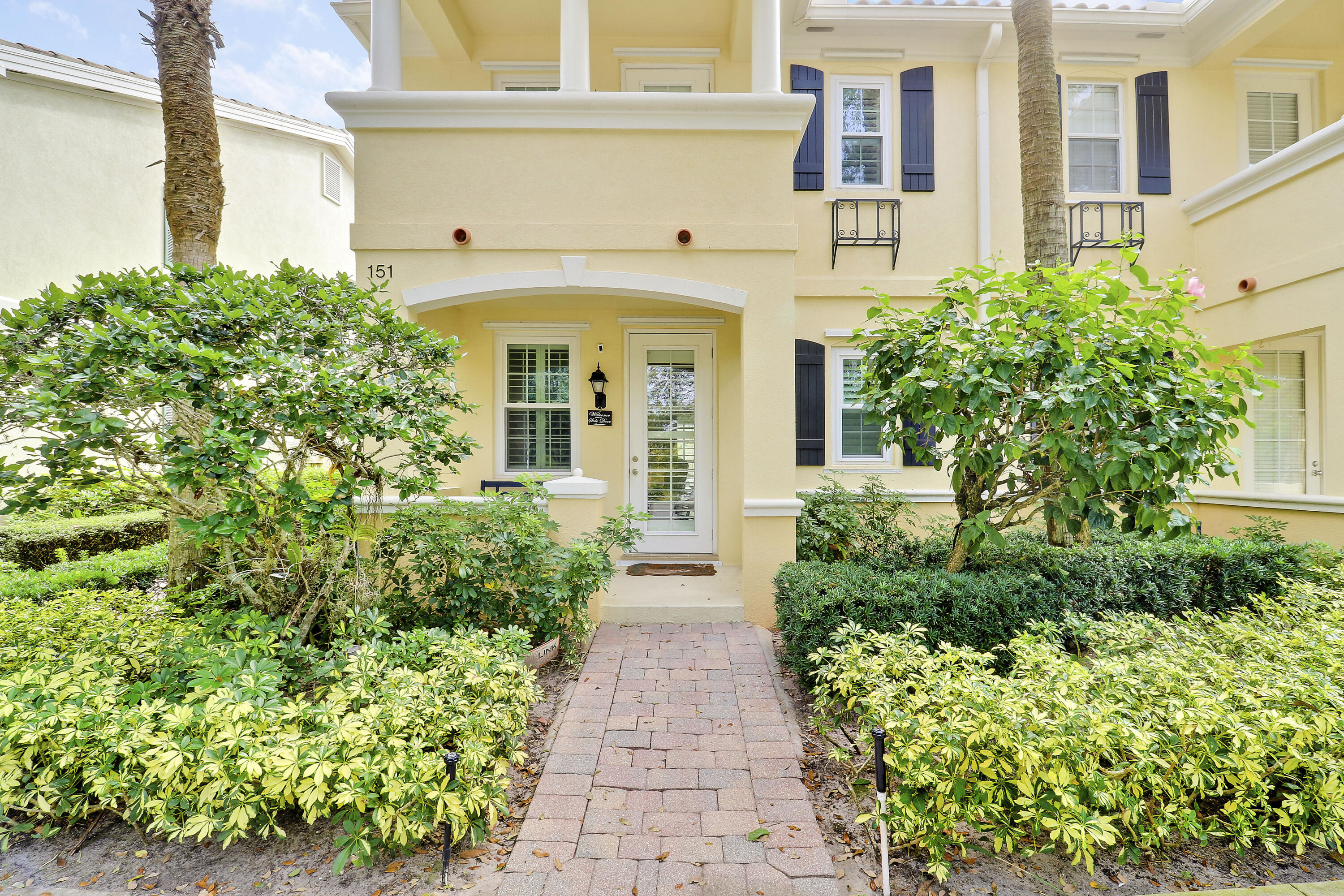 151 Rivinia Drive Jupiter, FL 33458 - Photo 2 of 40 front view of a house