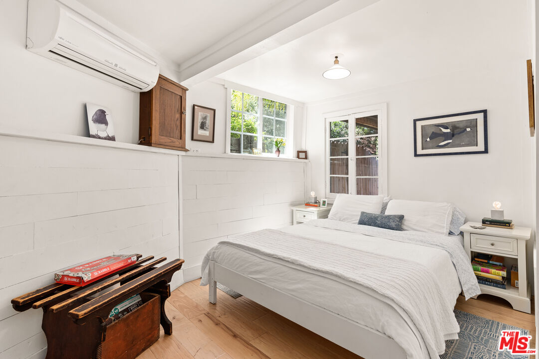 1553 Penny Road Topanga, CA 90290 - Photo 14 of 23 a bedroom with a bed and a window