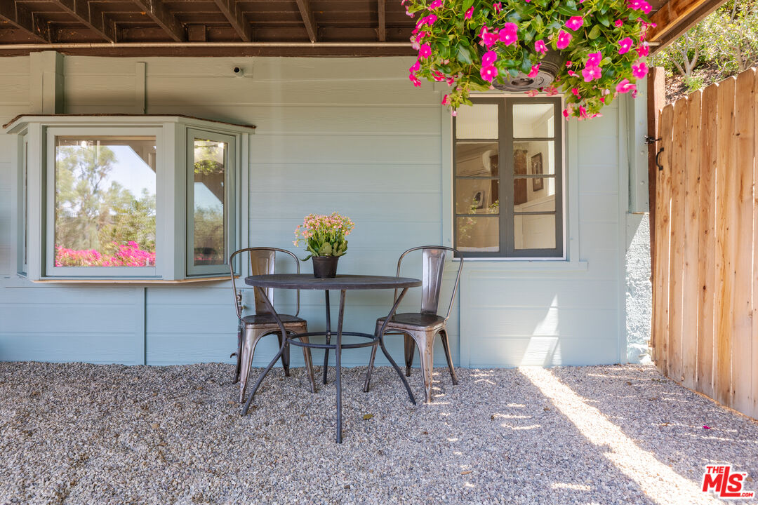 1553 Penny Road Topanga, CA 90290 - Photo 21 of 23 a workspace with furniture window and wooden floor