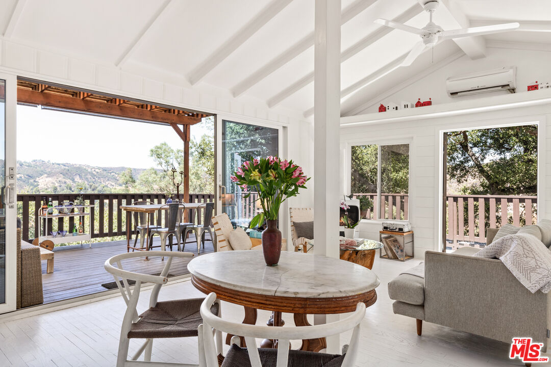 1553 Penny Road Topanga, CA 90290 - Photo 9 of 23 a dining room with furniture window and outdoor view