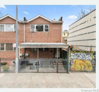 1101 Greene Avenue Brooklyn, NY 11221 - Photo 6 of 14 a view of a house with a patio
