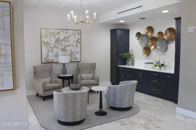 a bathroom with a sink double vanity and a mirror