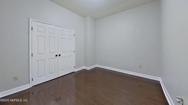 a bathroom with a shower and a sink