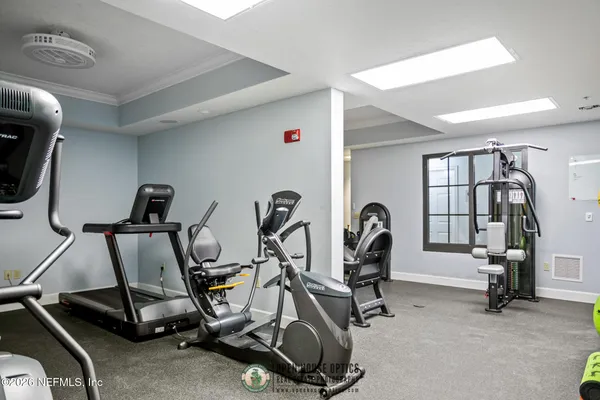 a view of swimming pool with a bench in front of house