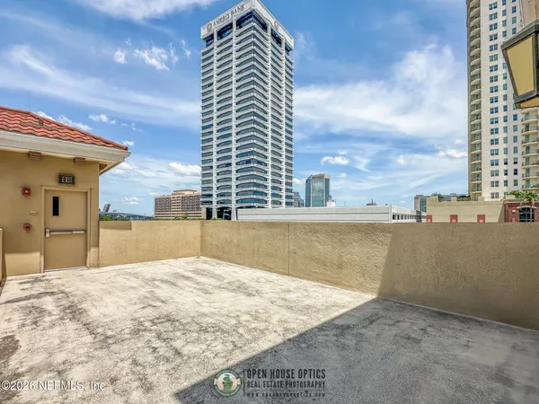 a view of a swimming pool with a porch