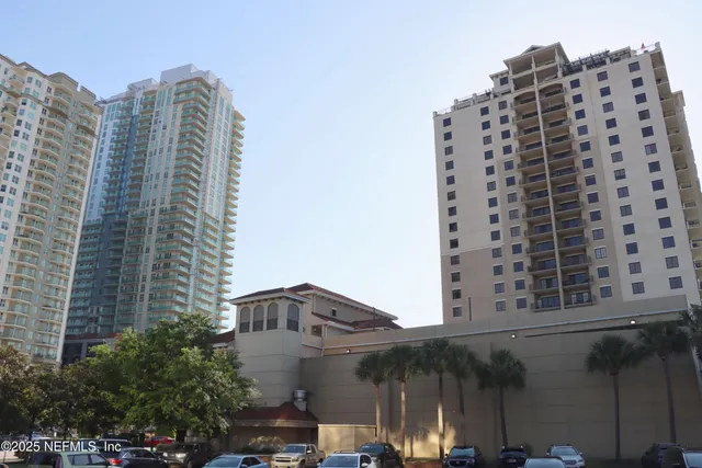 a view of a building with a street